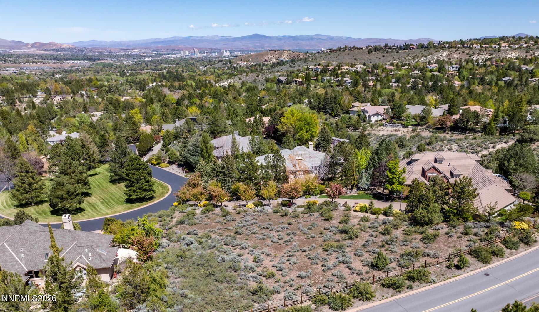 60 Promontory Pointe Reno, NV 89519 - Photo 17 of 18 a view of a city with mountains in the background