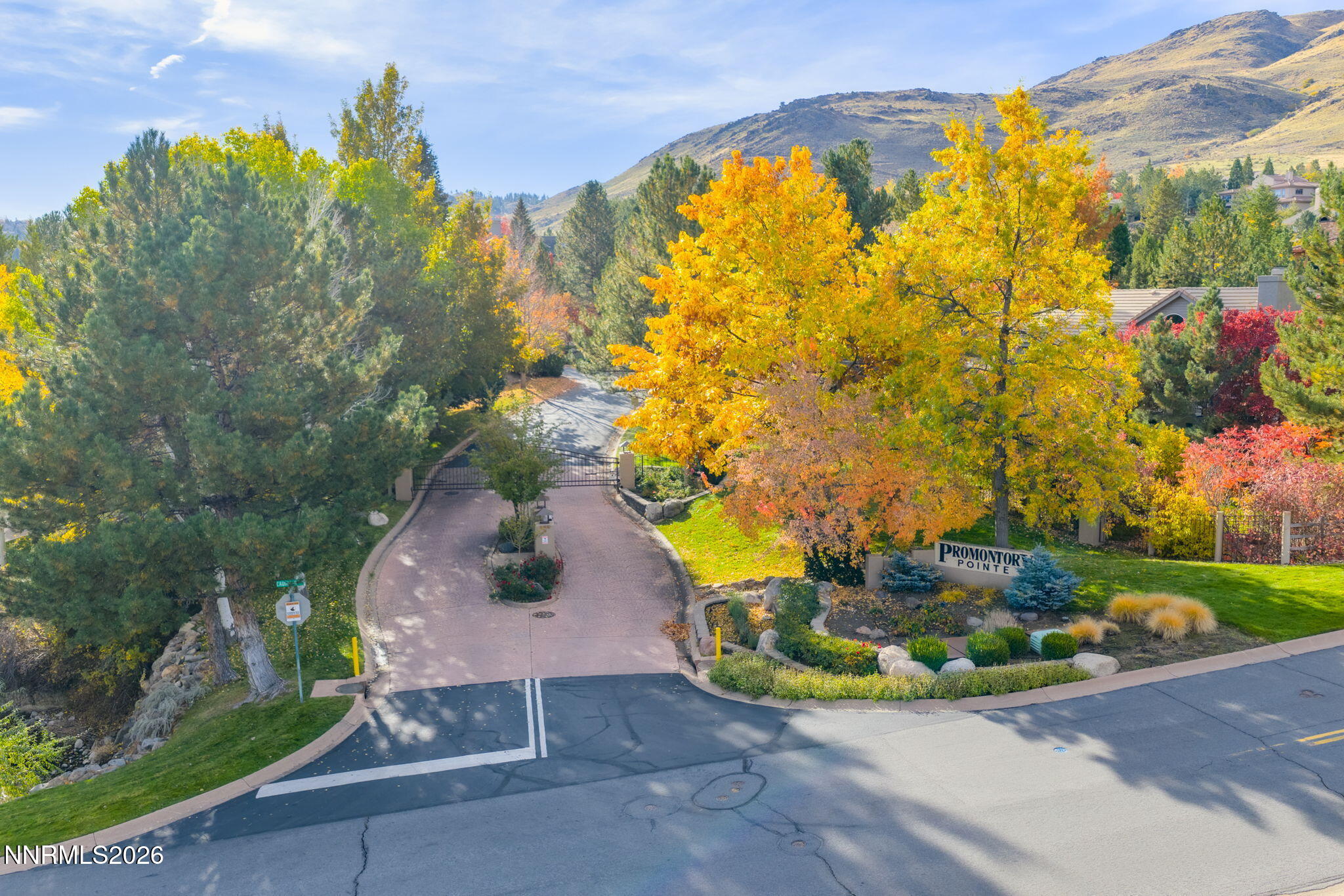 60 Promontory Pointe Reno, NV 89519 - Photo 4 of 18 a view of a swimming pool with a yard