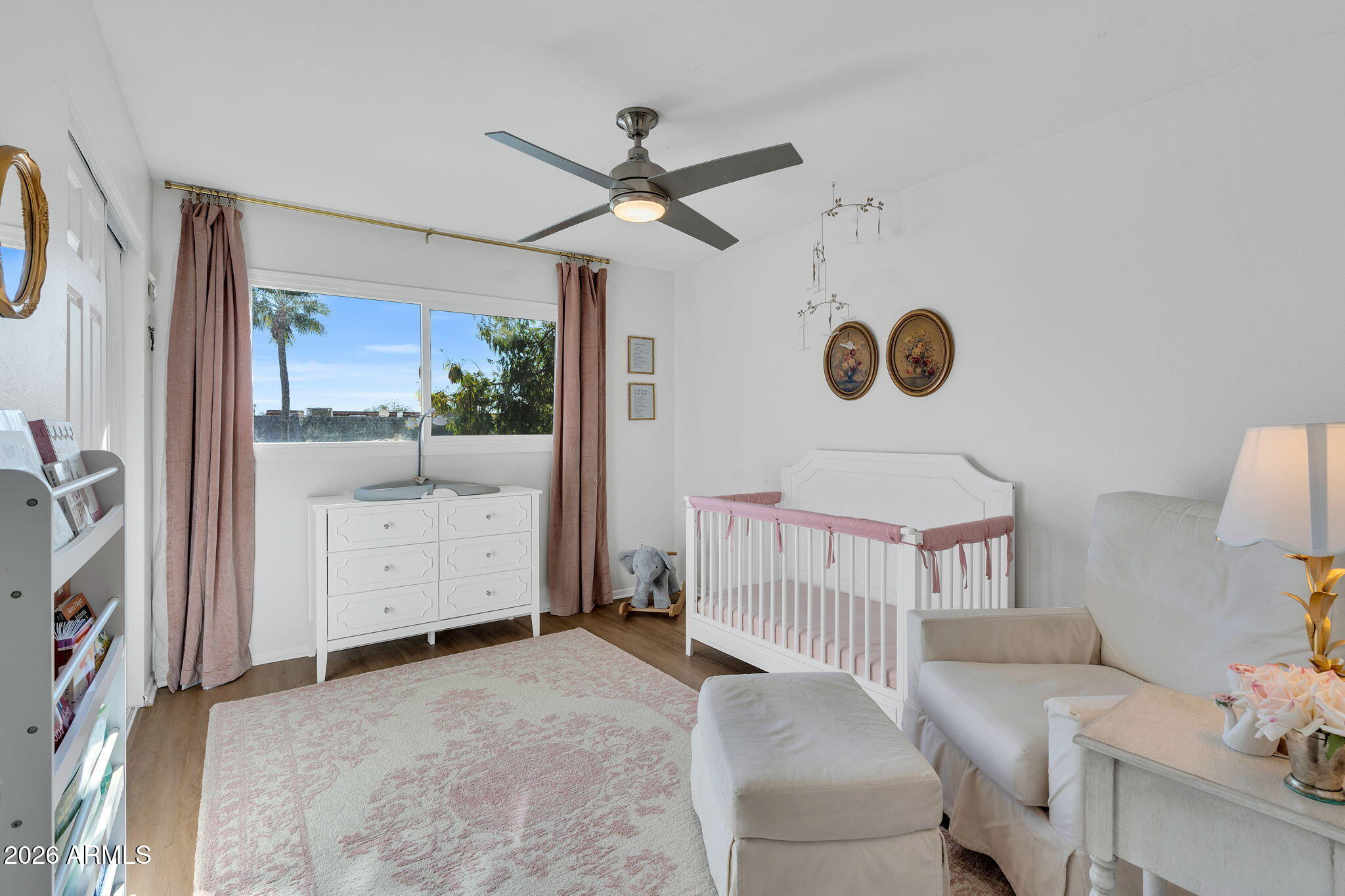 4217 North Miller Road Scottsdale, AZ 85251 - Photo 19 of 30 a bedroom with a bed and window