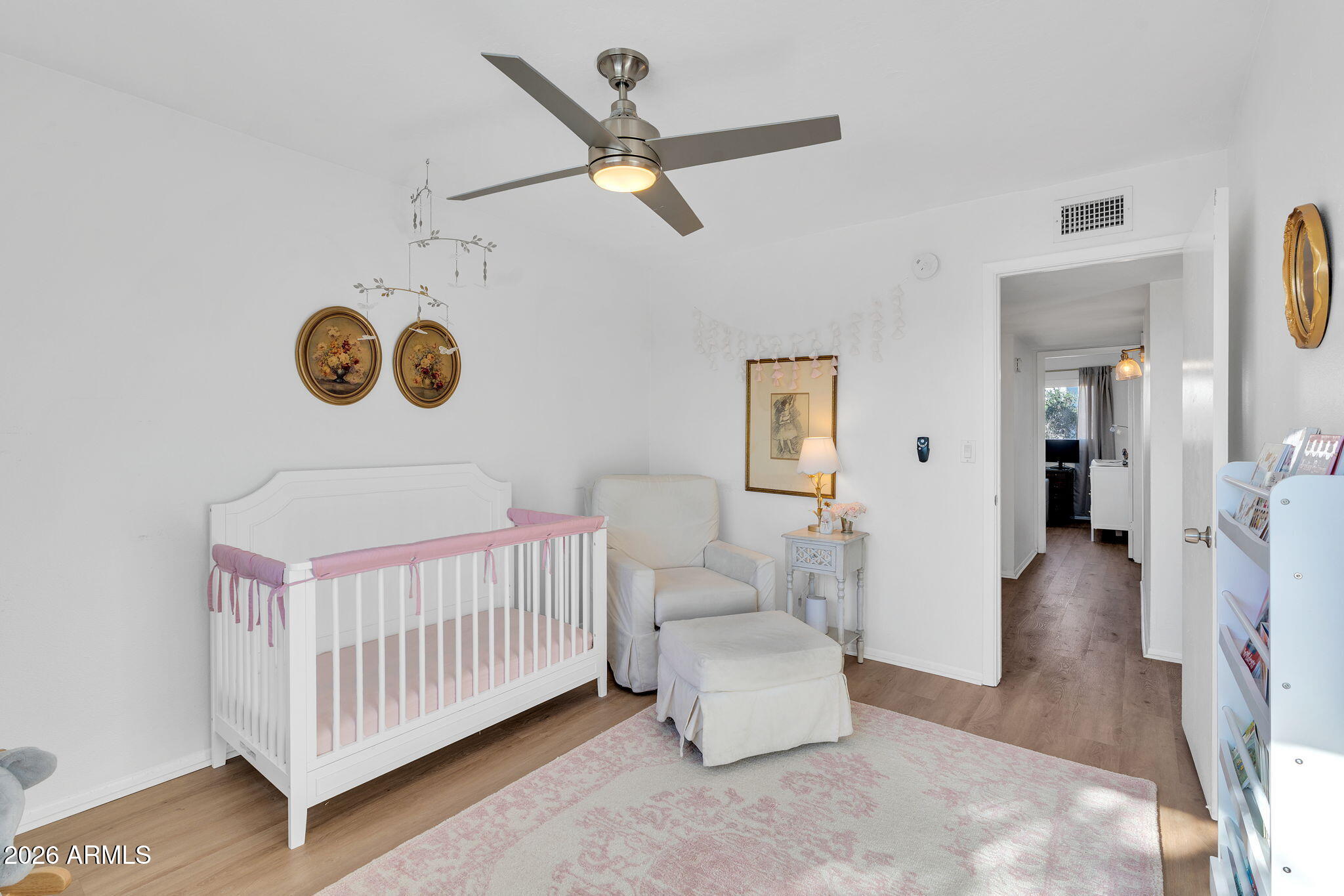 4217 North Miller Road Scottsdale, AZ 85251 - Photo 20 of 30 a bedroom with a baby bed furniture and a window