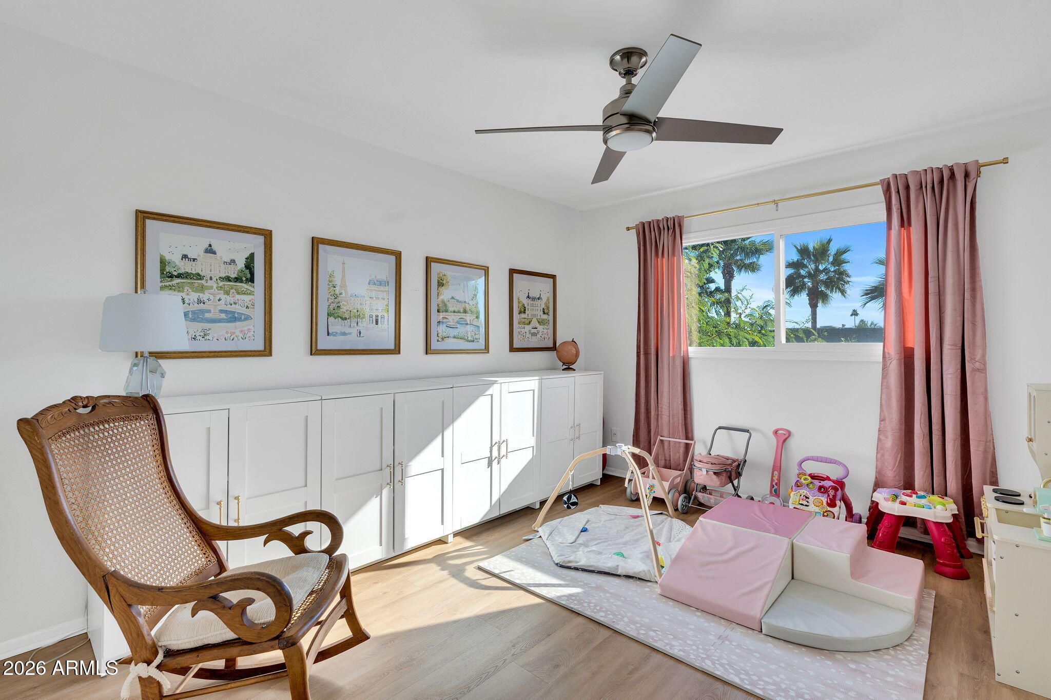 4217 North Miller Road Scottsdale, AZ 85251 - Photo 21 of 30 a living room with furniture and a window