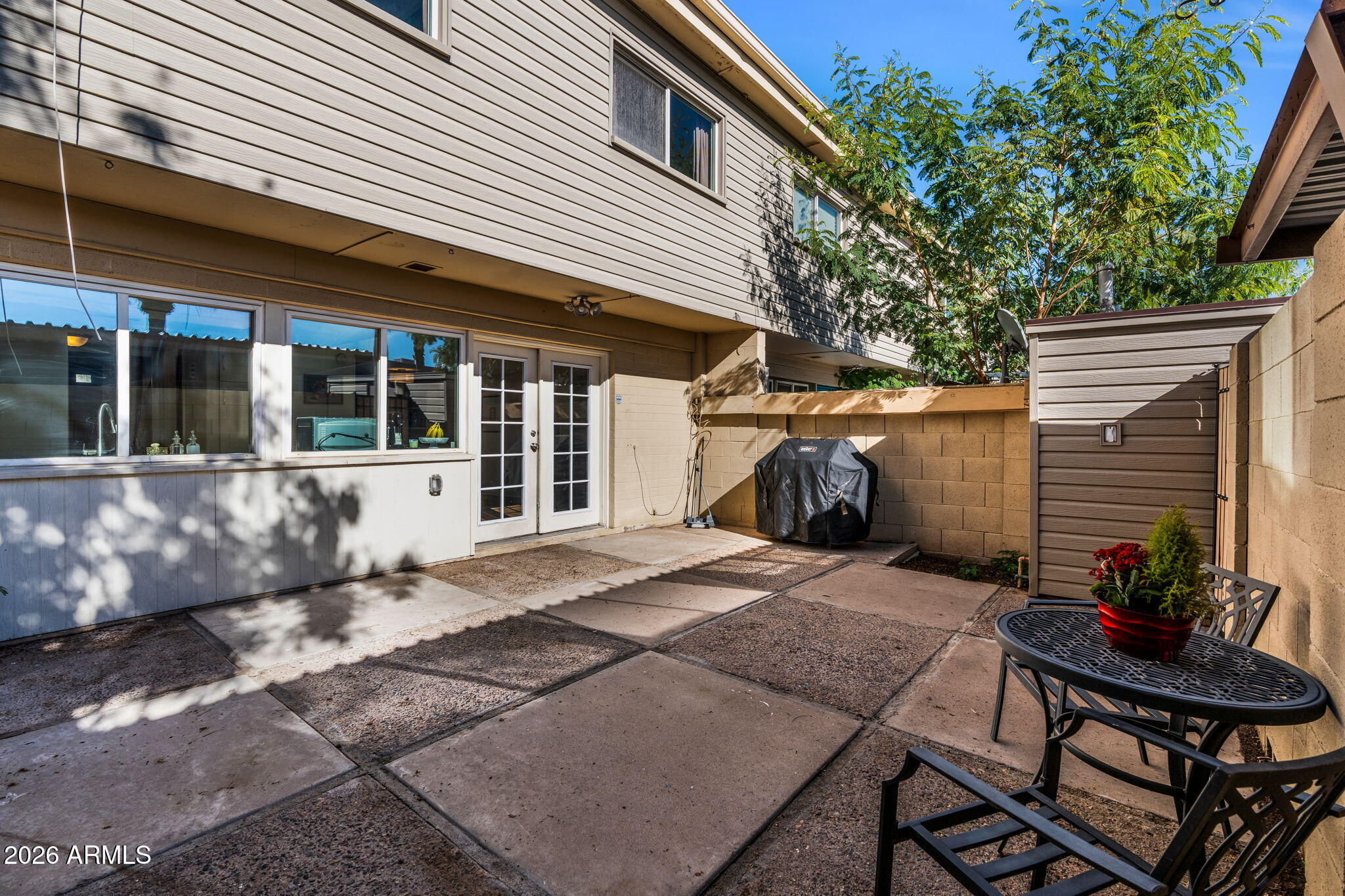 4217 North Miller Road Scottsdale, AZ 85251 - Photo 27 of 30 a view of a house with backyard and sitting area
