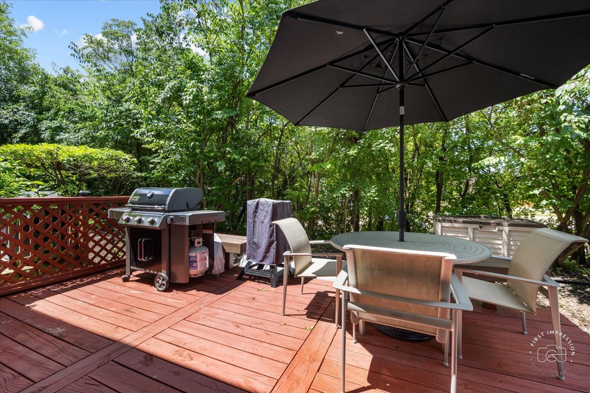 1015 Heathrow Court Wheaton, IL 60189 - Photo 18 of 18 a view of a roof deck with furniture