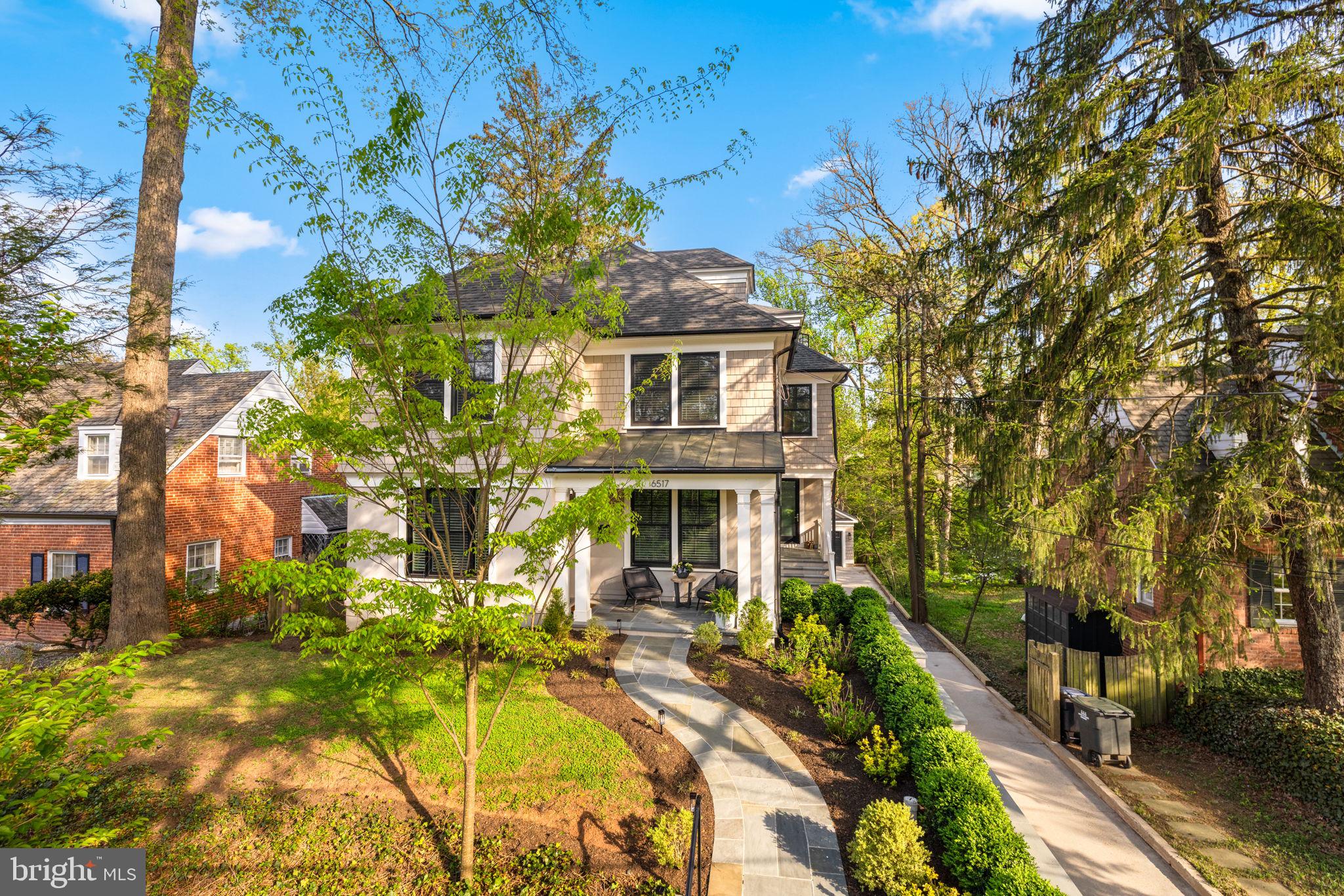 6517 Barnaby Street Northwest Washington, DC 20015 - Photo 1 of 20 a view of a house with a swimming pool