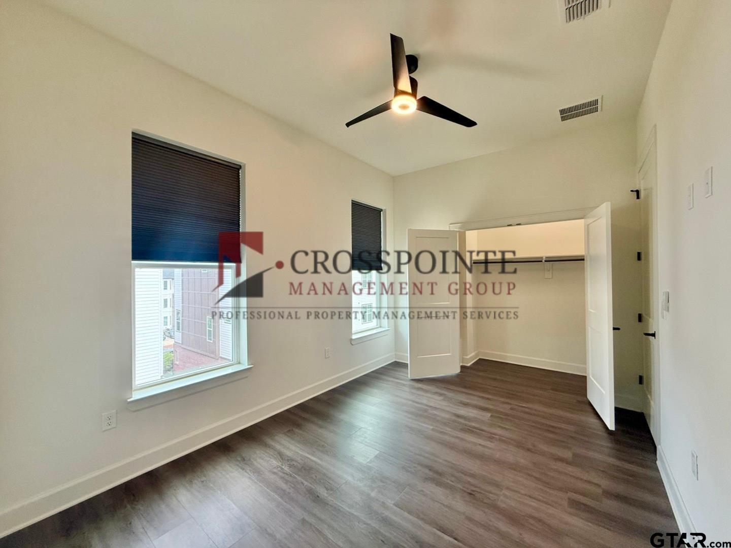 548 West Erwin Street Tyler, TX 75702 - Photo 23 of 27 a view of a livingroom with wooden floor