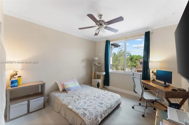 a bedroom with bed and walk in closet