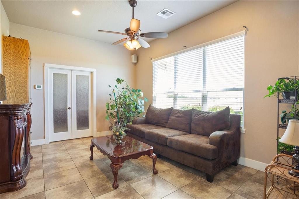 10479 Hartrick Bluff Road Little River-Academy, TX 76554 - Photo 12 of 40 a living room with furniture and a large window