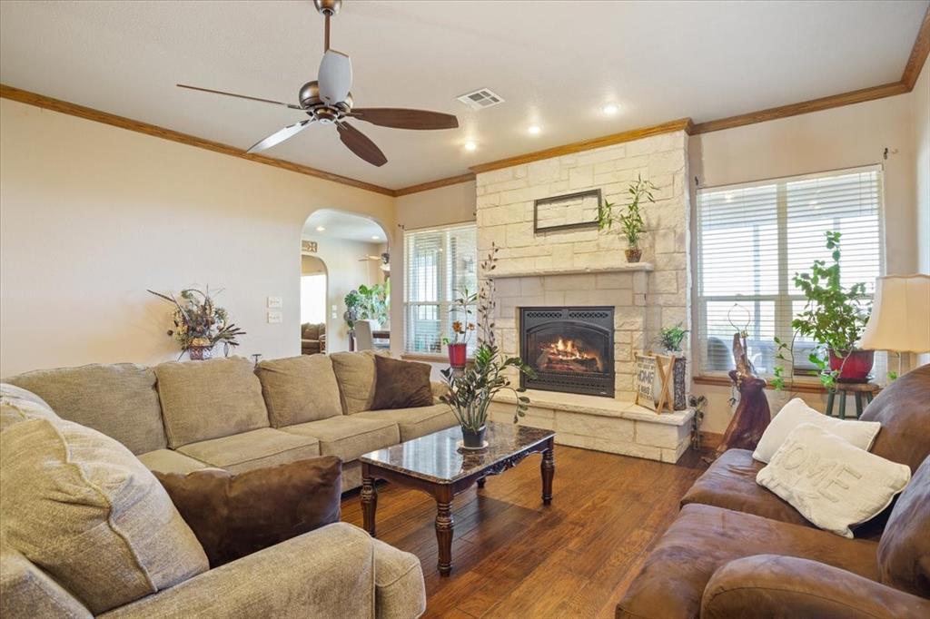 10479 Hartrick Bluff Road Little River-Academy, TX 76554 - Photo 18 of 40 a living room with furniture and a fireplace