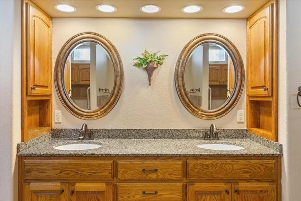 a bathroom with a bathtub and shower