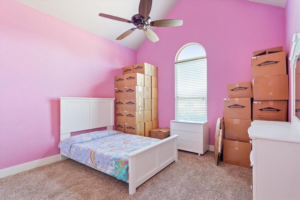 10479 Hartrick Bluff Road Little River-Academy, TX 76554 - Photo 30 of 40 a bedroom with a bed dresser and a window