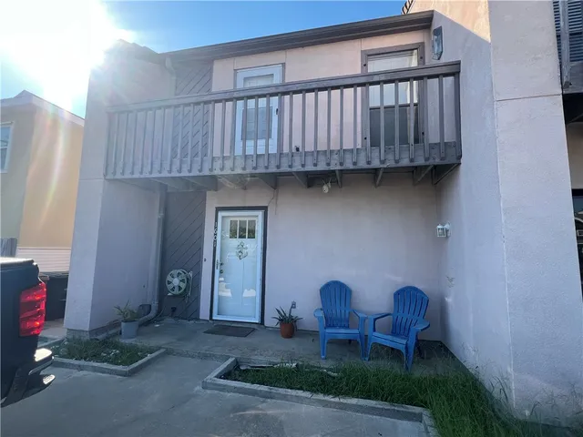 a view of a lounge chair in the patio