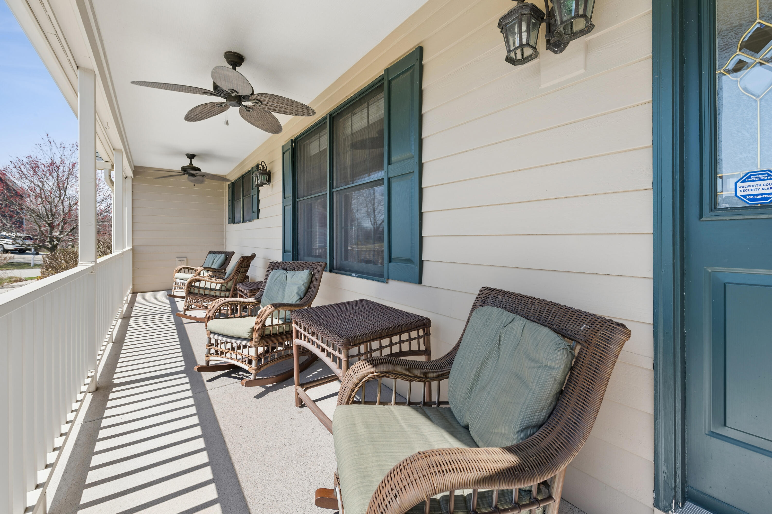 538 Pheasant Ridge Lane Fontana, WI 53125 - Photo 21 of 23 Shaded front porch