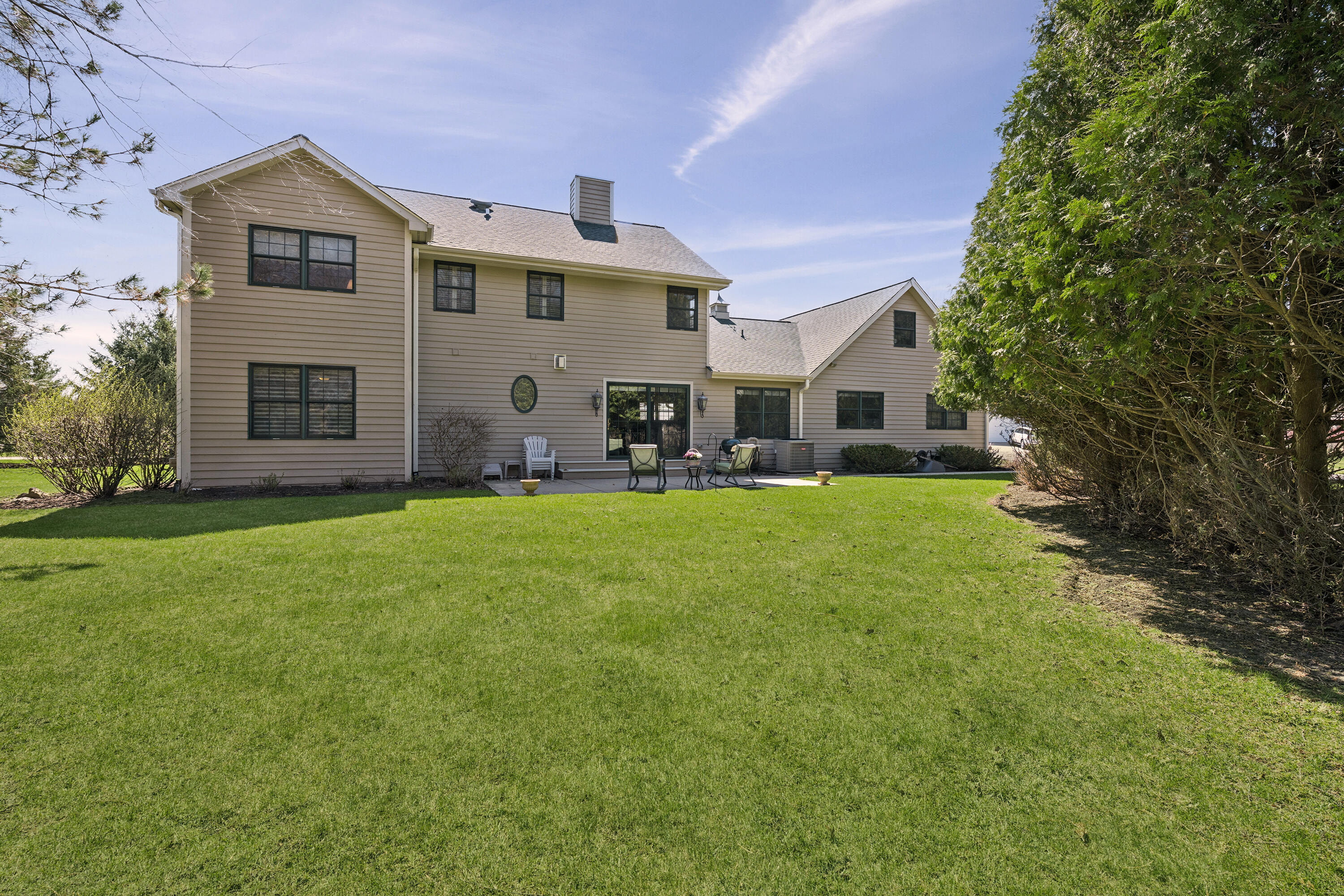 538 Pheasant Ridge Lane Fontana, WI 53125 - Photo 23 of 23 Wooded backyard w/patio
