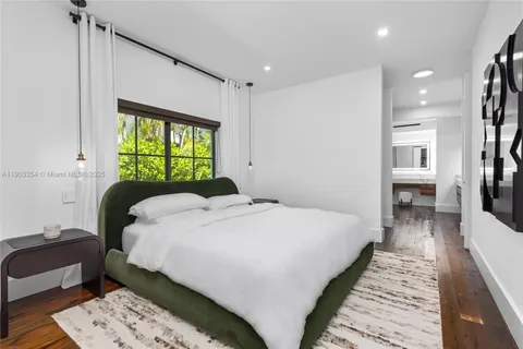 a white bath tub sitting in a bathroom