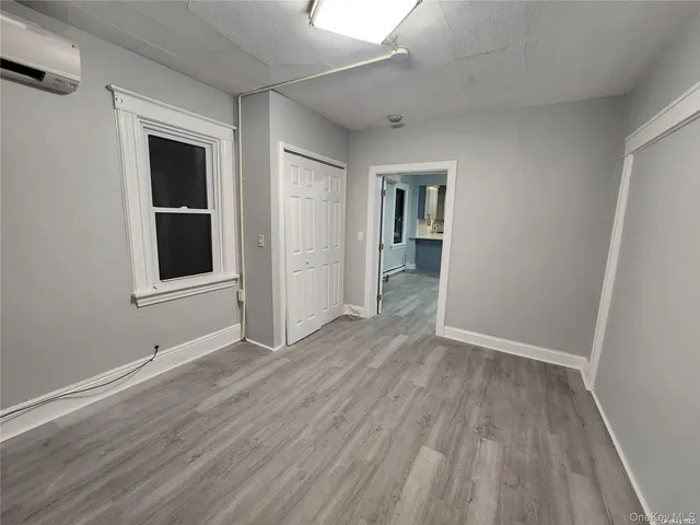 wooden floor and windows in an empty room