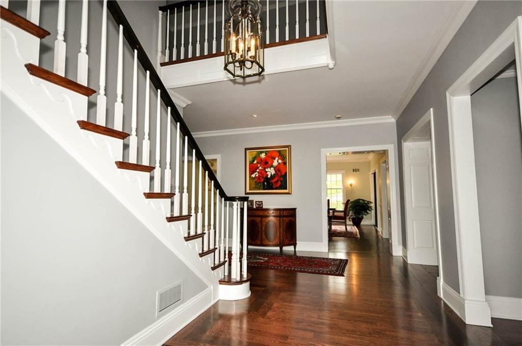 815 Fox Chapel Road Fox Chapel, PA 15238 - Photo 2 of 25 The spacious 2 story open entry features gleaming hardwood floors and a grand staircase leading to the second floor.