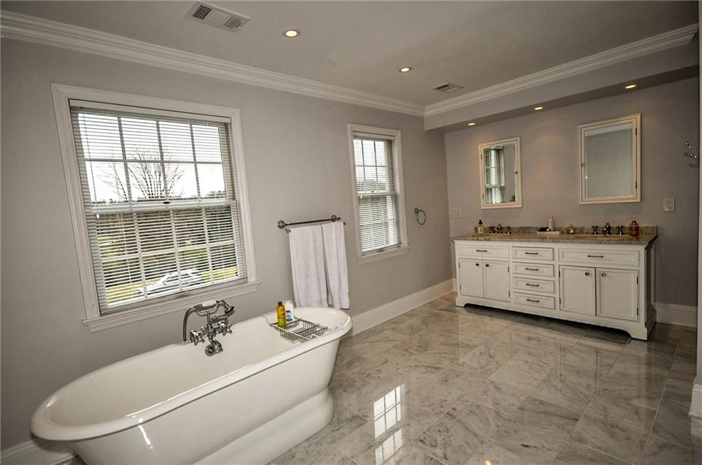 815 Fox Chapel Road Fox Chapel, PA 15238 - Photo 13 of 25 Unbelievable master bath with marble floors, oversized soaking tub, triple vanity with double sinks, full walk-in shower and top of the line faucets is a great space to enjoy some quiet time .