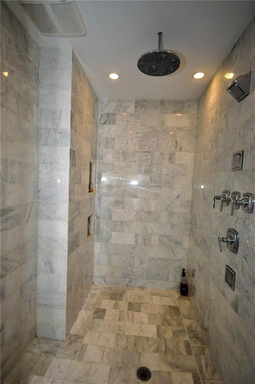 815 Fox Chapel Road Fox Chapel, PA 15238 - Photo 14 of 25 Oversized walk in rain shower features beautiful tile and room to spare.