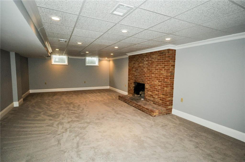 815 Fox Chapel Road Fox Chapel, PA 15238 - Photo 16 of 25 Full lower level could be a great media room, or a space for a pool table, or just multiple seating areas.