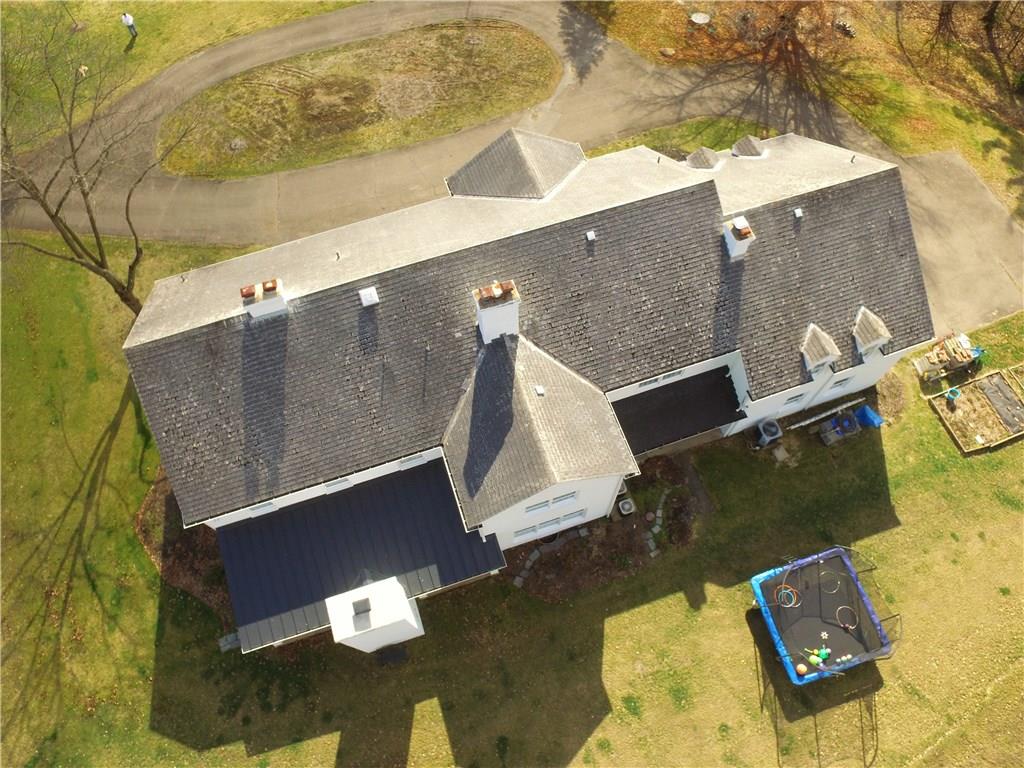 815 Fox Chapel Road Fox Chapel, PA 15238 - Photo 23 of 25 View shows a good roof and the circle driveway that leads to the attached 3 car garage on the side of the home