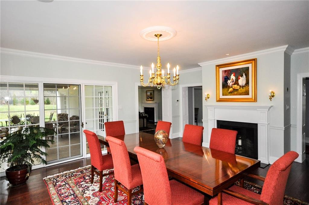 815 Fox Chapel Road Fox Chapel, PA 15238 - Photo 4 of 25 Unbelievable dining room allows space for a 9 ft. table. Double doors open to the outside entertainment area. The multiple windows and doors allow a lot of light into the room all year long.