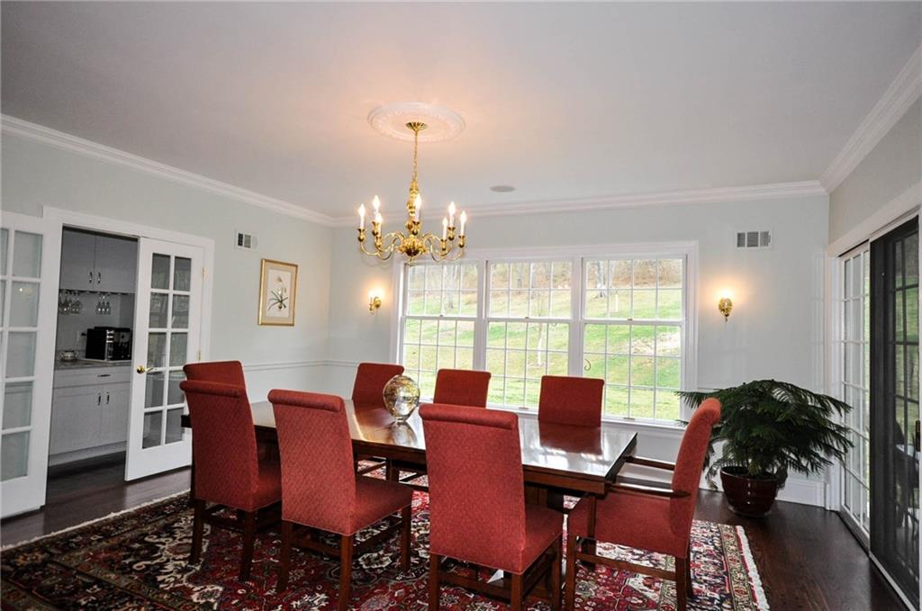 815 Fox Chapel Road Fox Chapel, PA 15238 - Photo 5 of 25 This wonderful dining room provides an area for dining at it's best. Easy access to the full wet bar and kitchen areas adds to the convenient and easy flow of the room.