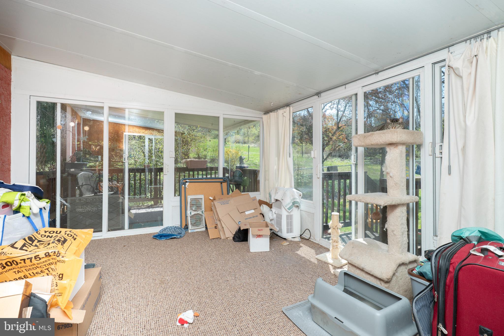 20 Cromby Road Phoenixville, PA 19460 - Photo 9 of 33 Sunporch off Kitchen, Side Covered Patio as Well
