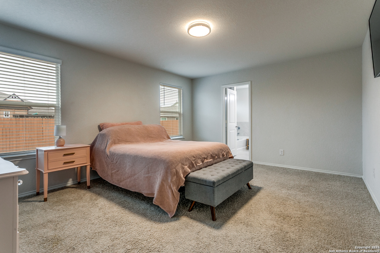 29632 Winter Copper Bulverde, TX 78163 - Photo 13 of 26 a spacious bedroom with a bed and a window