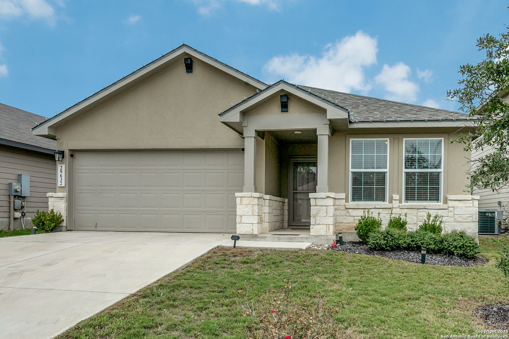 29632 Winter Copper Bulverde, TX 78163 - Photo 2 of 26 a front view of a house with garden