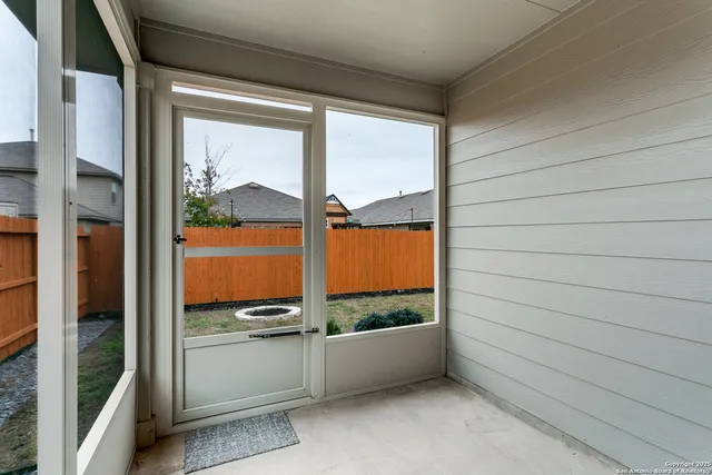 a view of an outdoor space with a large window