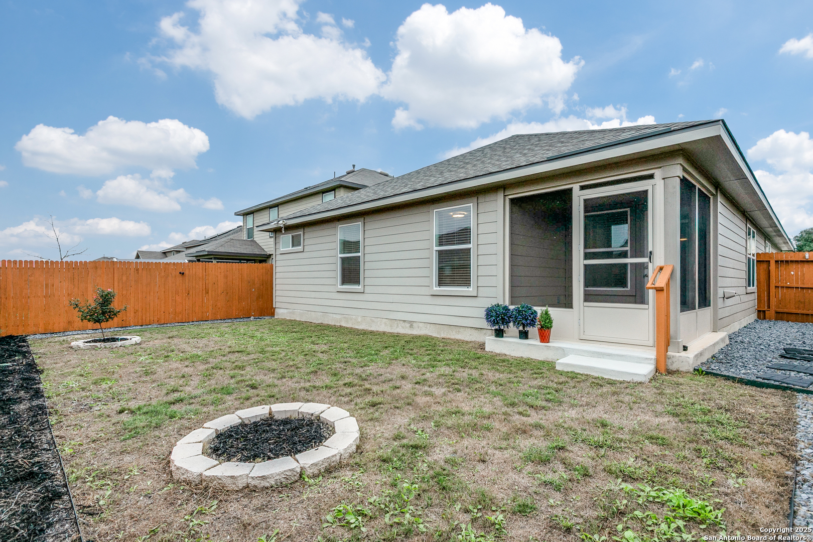 29632 Winter Copper Bulverde, TX 78163 - Photo 23 of 26 a backyard of a house with table and chairs