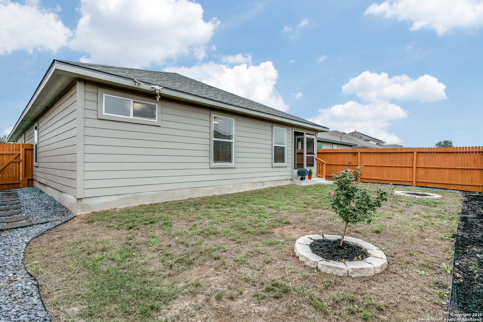 29632 Winter Copper Bulverde, TX 78163 - Photo 24 of 26 a backyard of a house with plants and outdoor seating