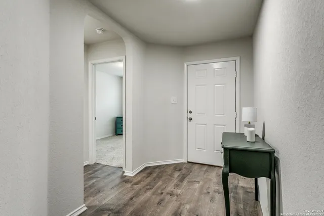 a view of a room with a table and chair