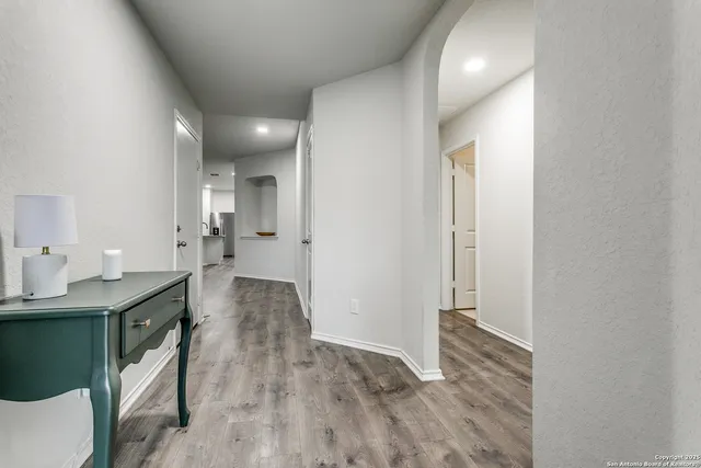 a view of a bathroom from the hallway