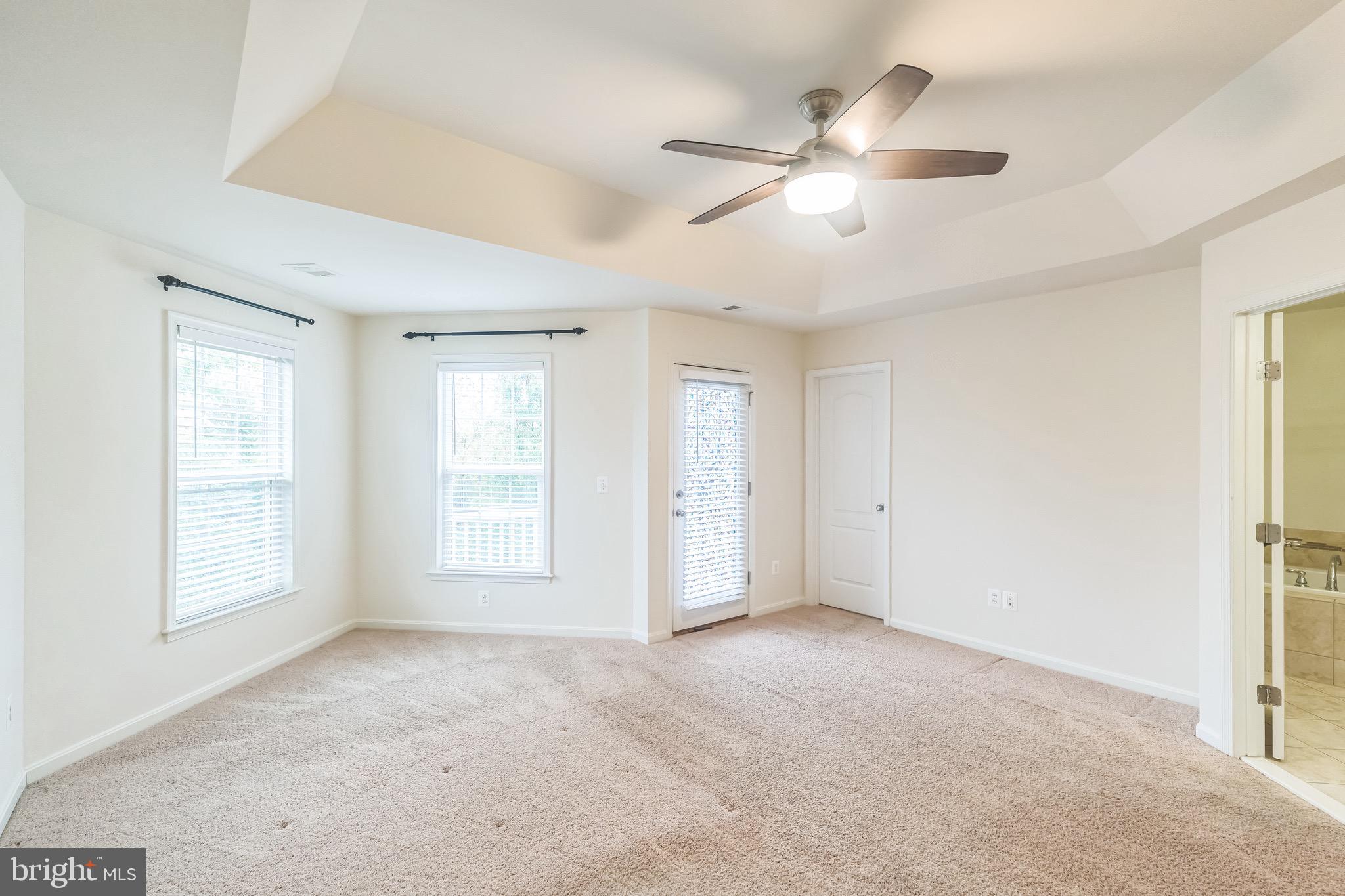 42385 Trellis Square Brambleton, VA 20148 - Photo 17 of 28 a view of an empty room with a window