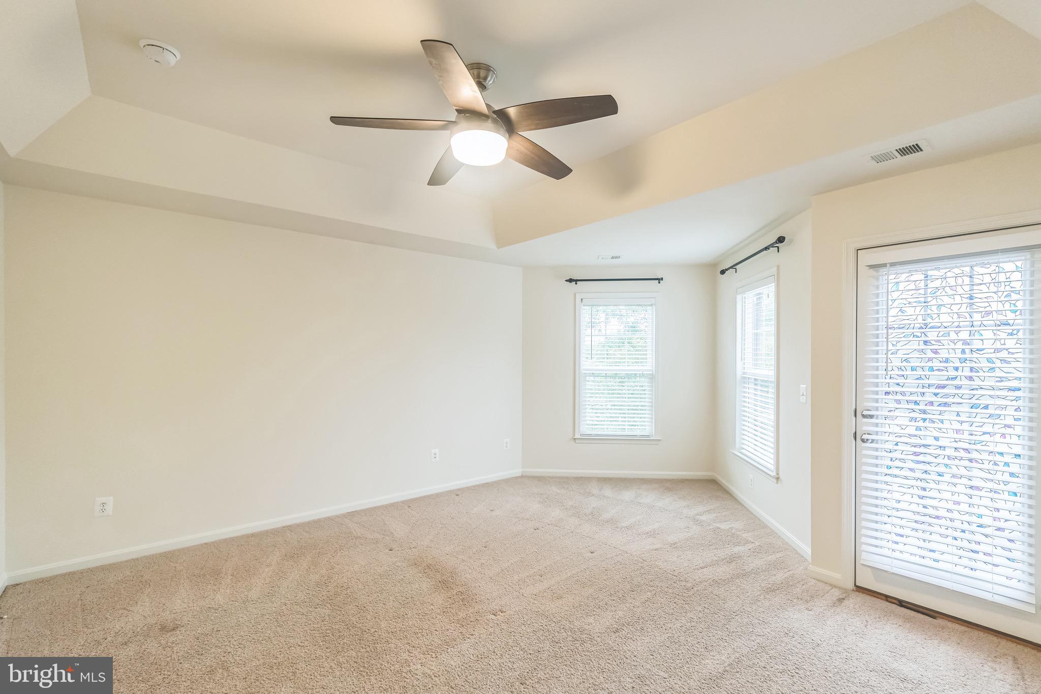 42385 Trellis Square Brambleton, VA 20148 - Photo 18 of 28 a view of an empty room with a window