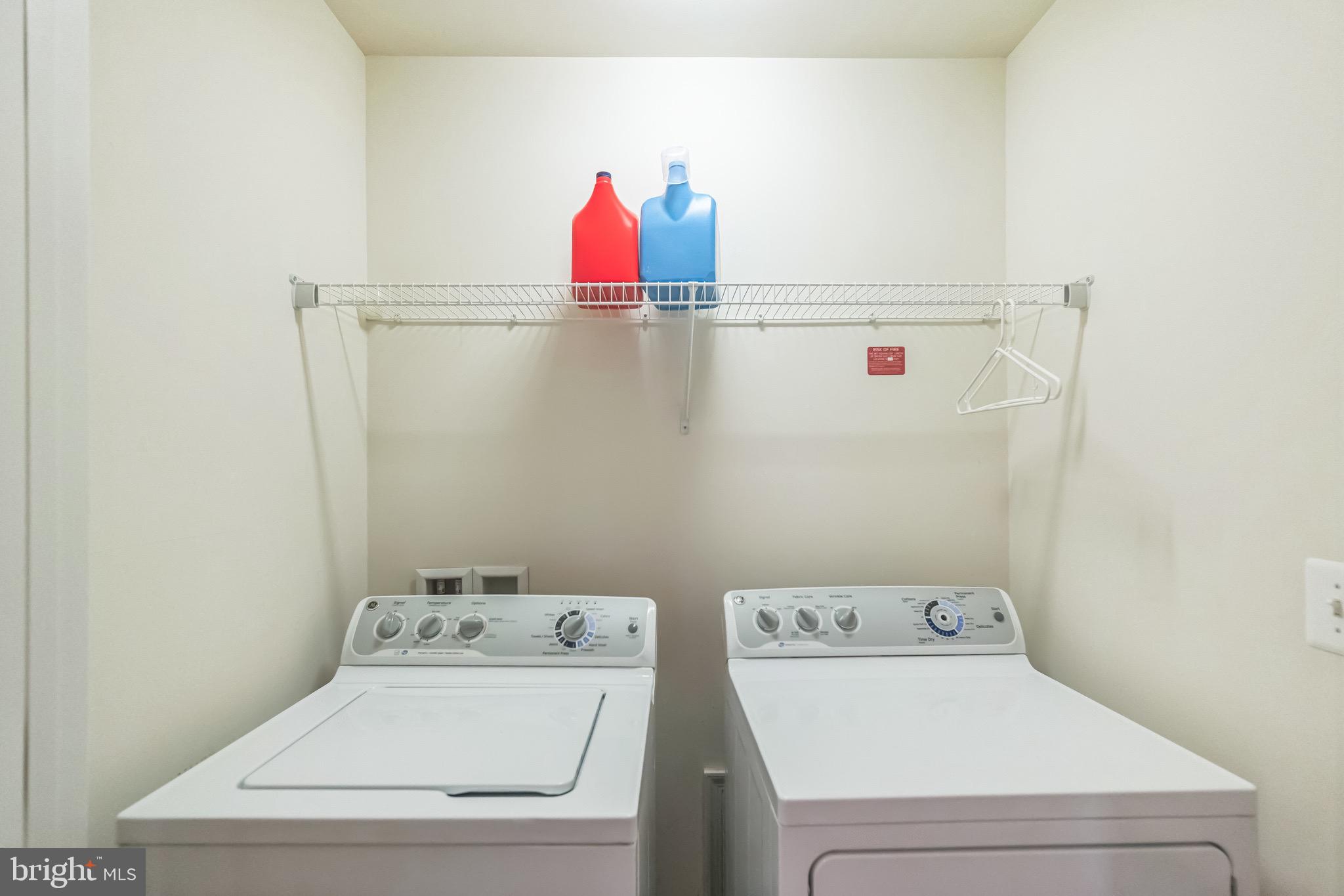 42385 Trellis Square Brambleton, VA 20148 - Photo 27 of 28 a utility room with dryer and washer