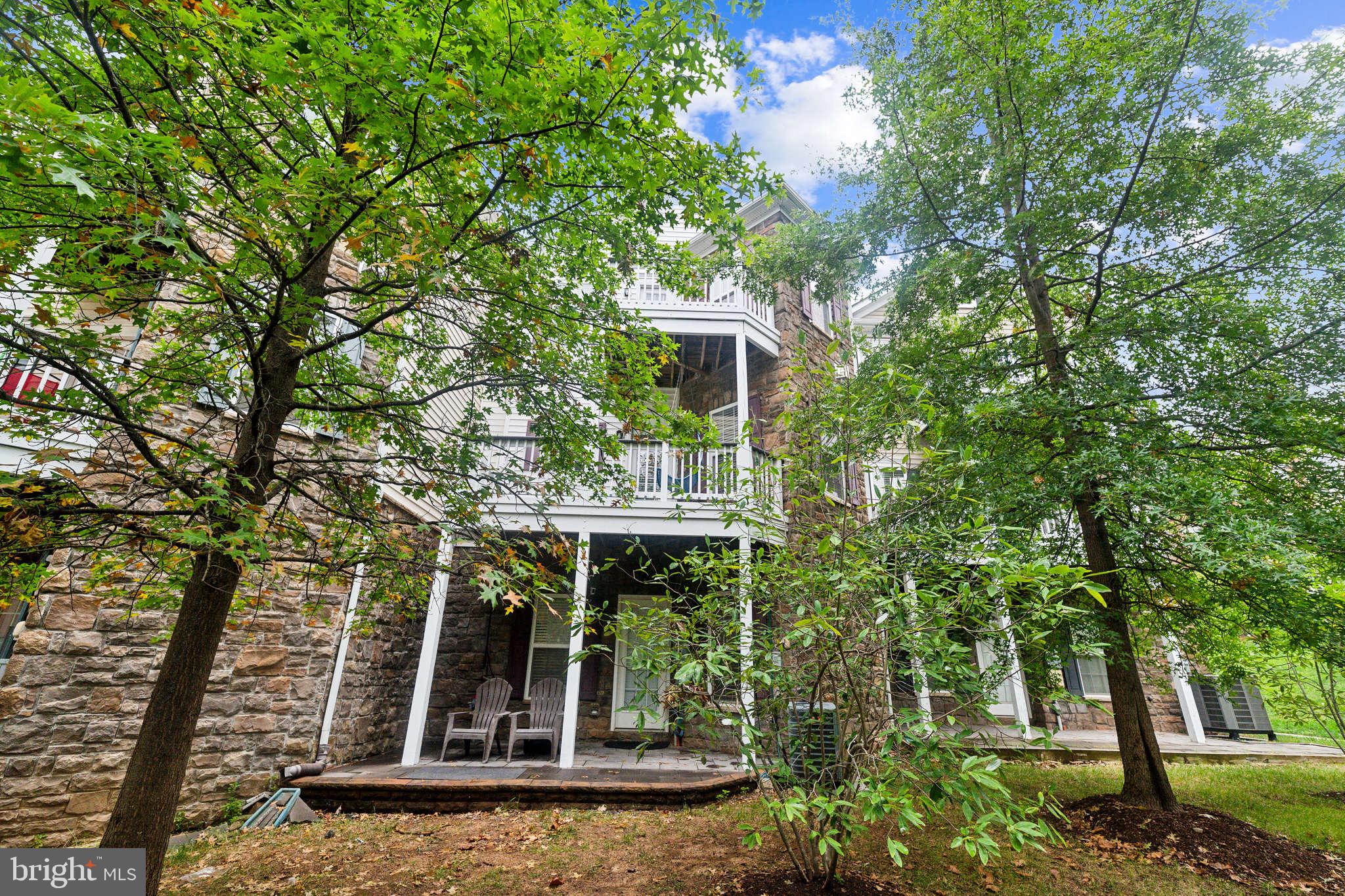 42385 Trellis Square Brambleton, VA 20148 - Photo 28 of 28 a view of a house with a tree