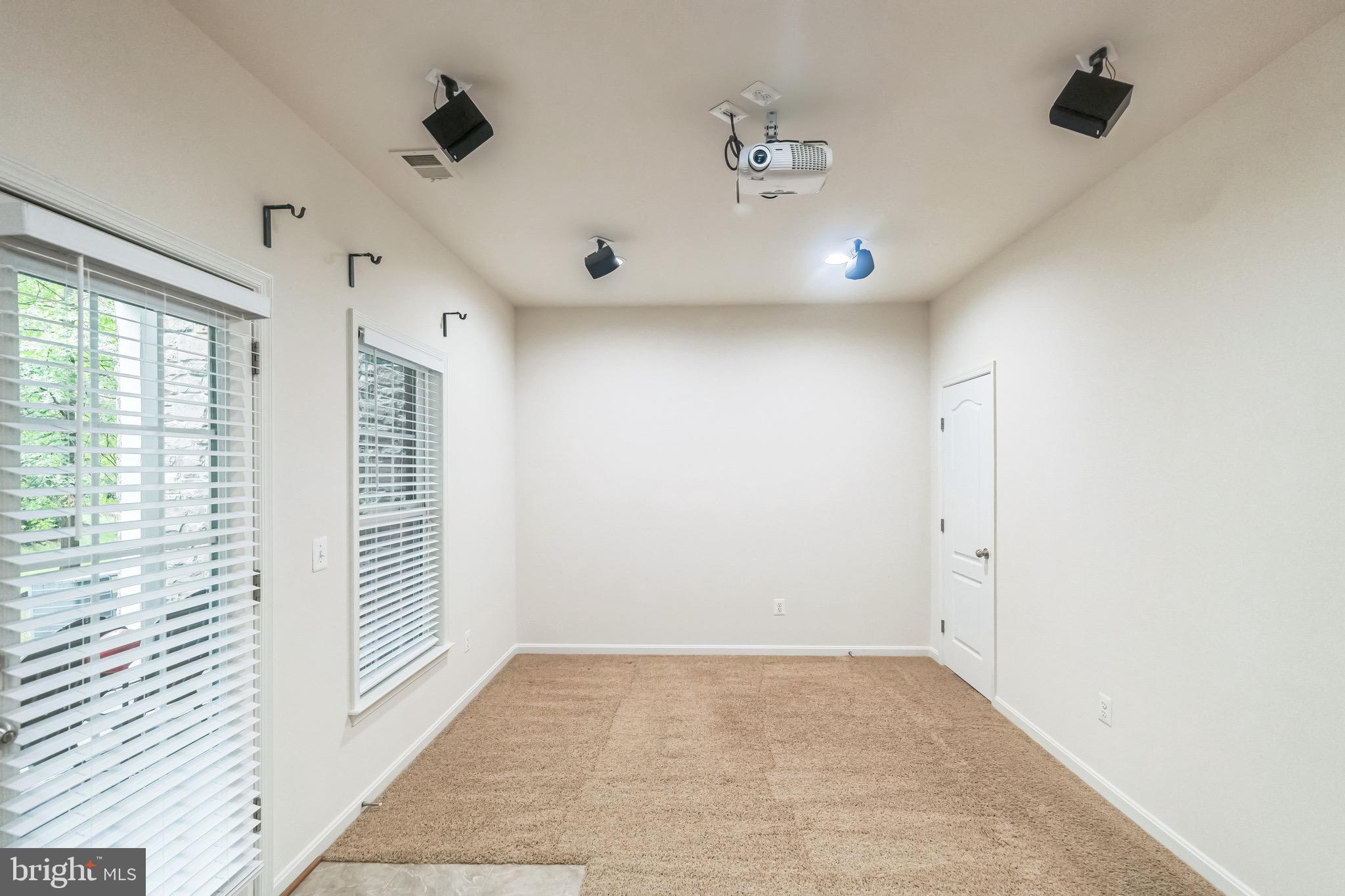 42385 Trellis Square Brambleton, VA 20148 - Photo 6 of 28 a view of an empty room with a window
