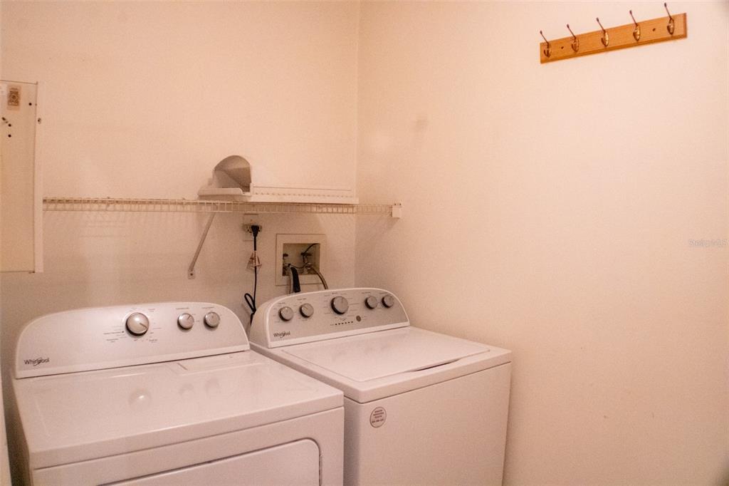 601 Shady Point Way Deland, FL 32724 - Photo 28 of 33 a utility room with dryer and washer