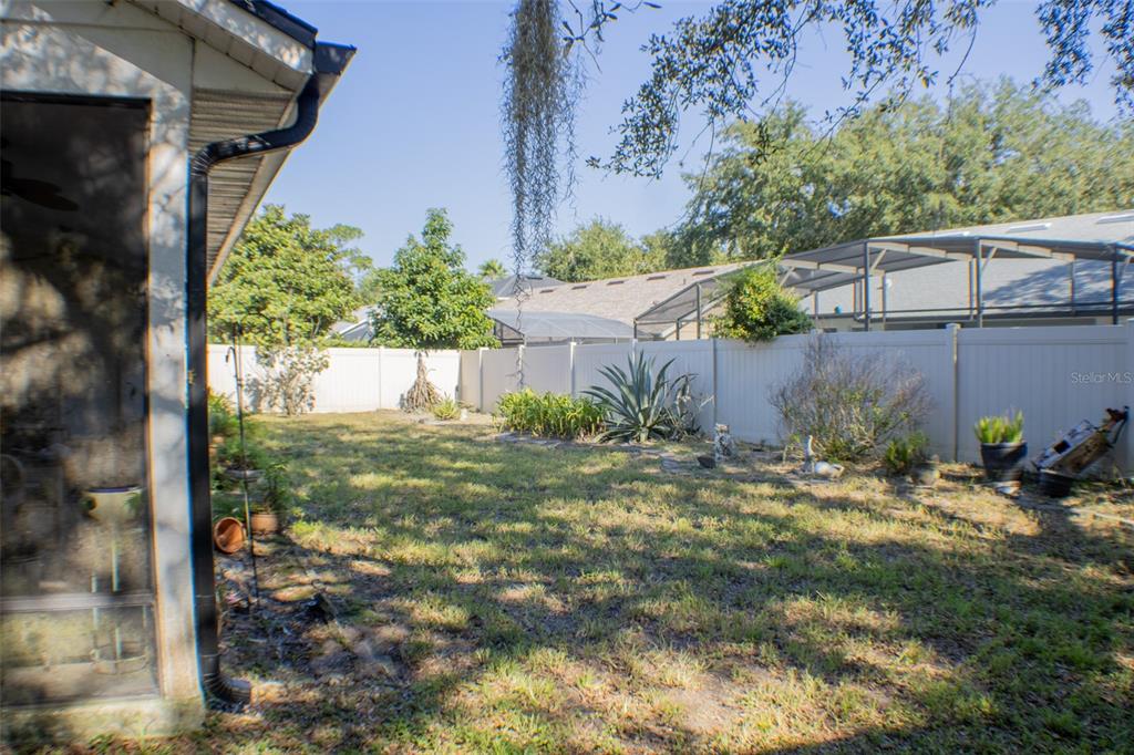 601 Shady Point Way Deland, FL 32724 - Photo 31 of 33 a view of a backyard
