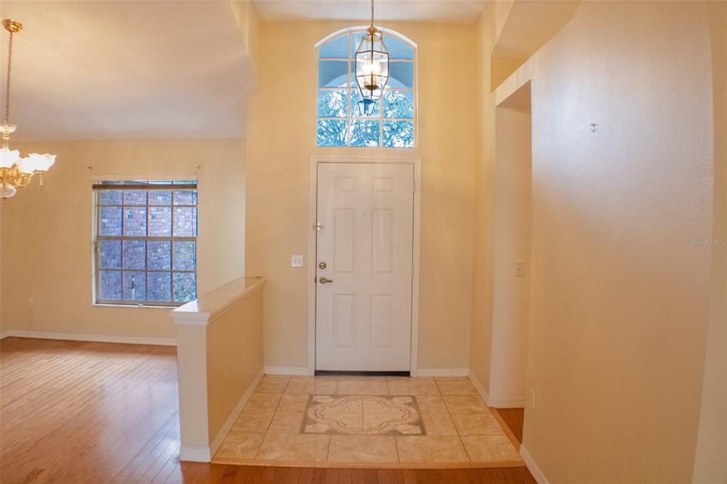 601 Shady Point Way Deland, FL 32724 - Photo 10 of 33 wooden floor in an empty room