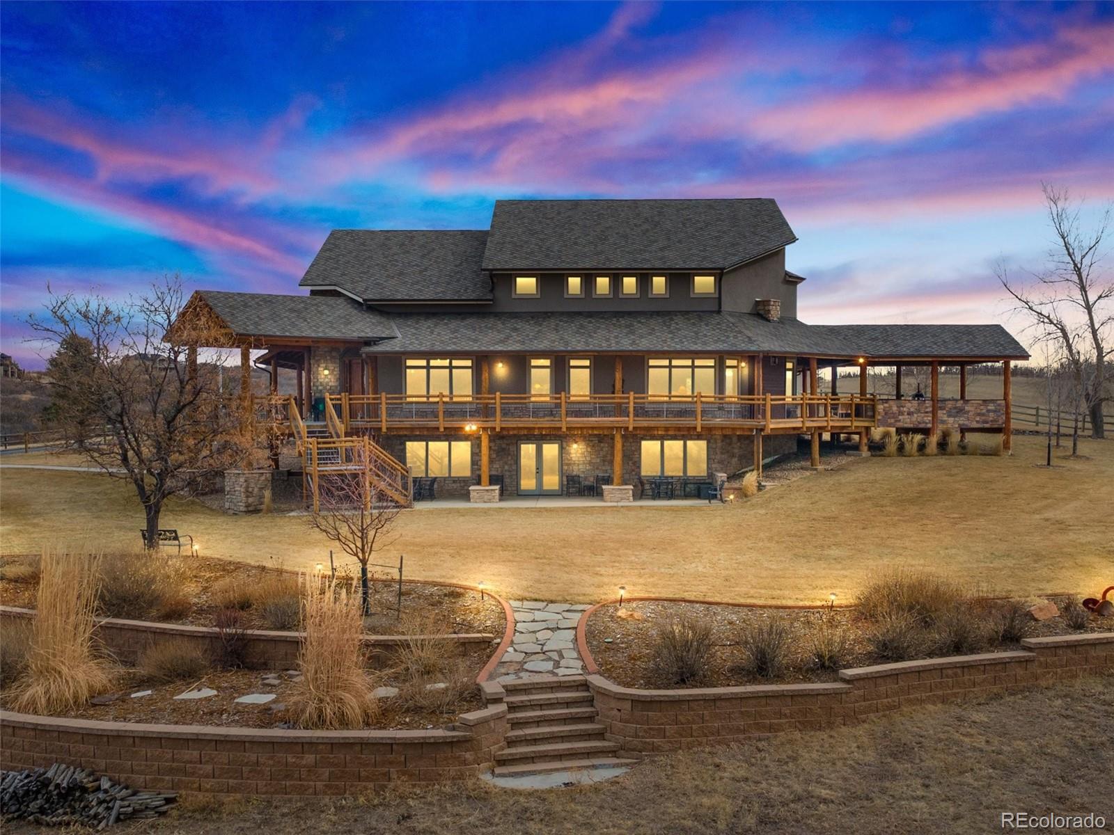 a view of a swimming pool with a yard