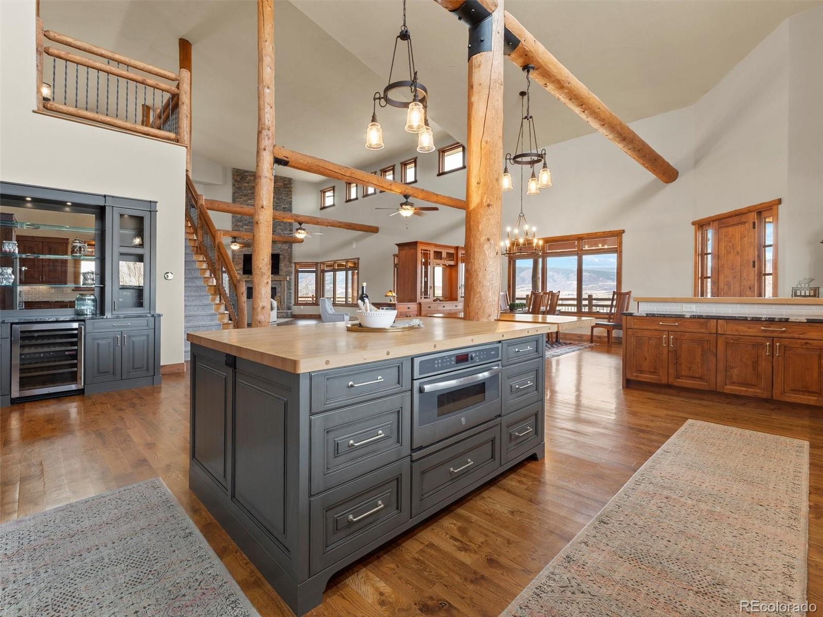 934 South Perry Park Road Sedalia, CO 80135 - Photo 13 of 48 a kitchen with stainless steel appliances granite countertop a stove and cabinets