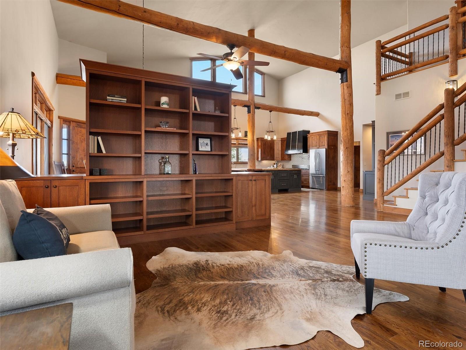 934 South Perry Park Road Sedalia, CO 80135 - Photo 16 of 48 a living room with furniture