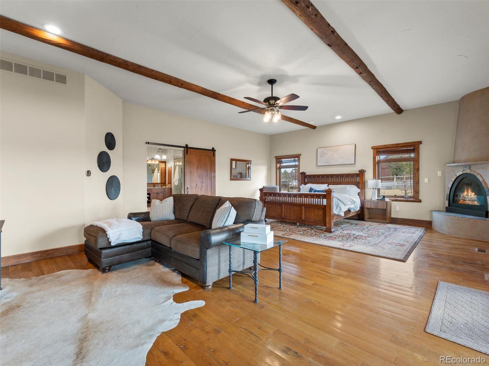 934 South Perry Park Road Sedalia, CO 80135 - Photo 21 of 48 a living room with furniture and a large window