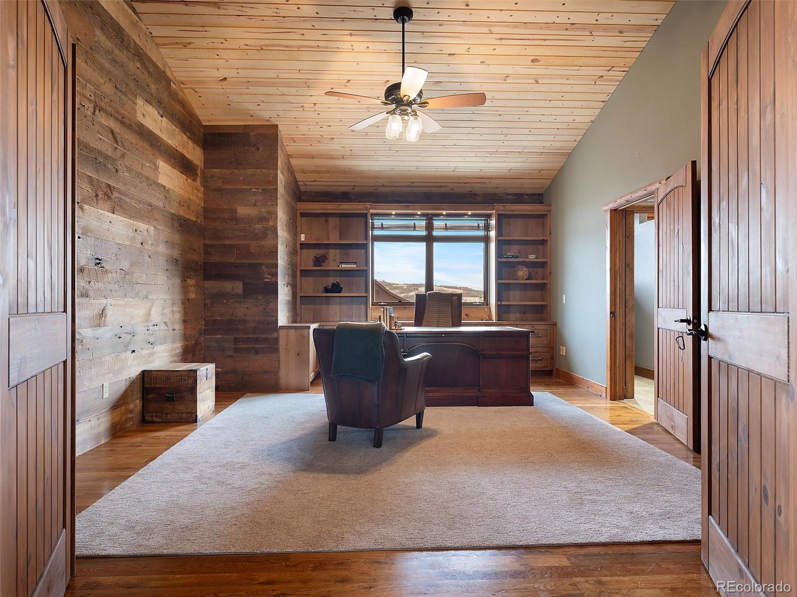 934 South Perry Park Road Sedalia, CO 80135 - Photo 34 of 48 a view of a livingroom with furniture and window