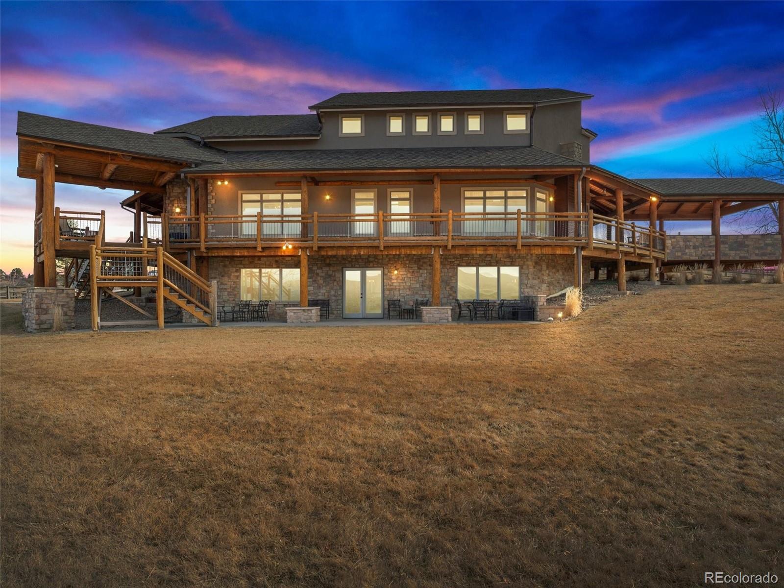 934 South Perry Park Road Sedalia, CO 80135 - Photo 4 of 48 a view of a house with backyard