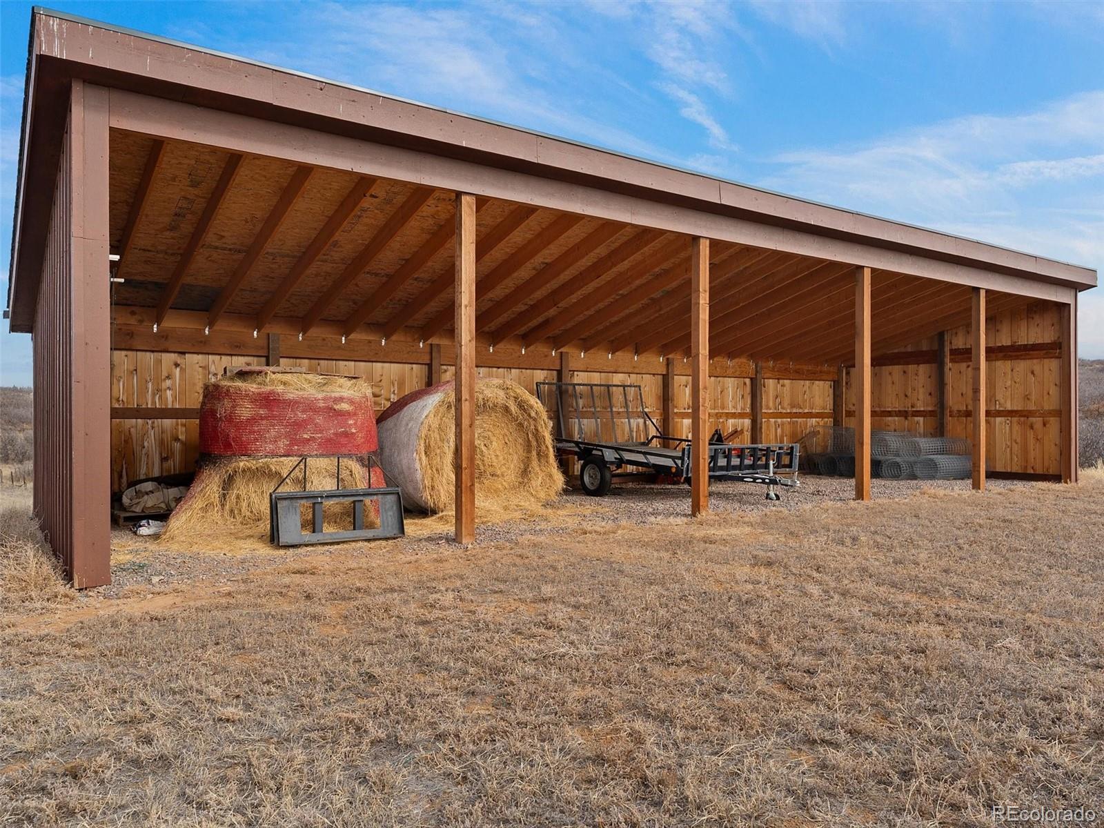 934 South Perry Park Road Sedalia, CO 80135 - Photo 42 of 48 a view of a room with gym equipment