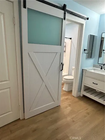 a bathroom with a sink and a toilet